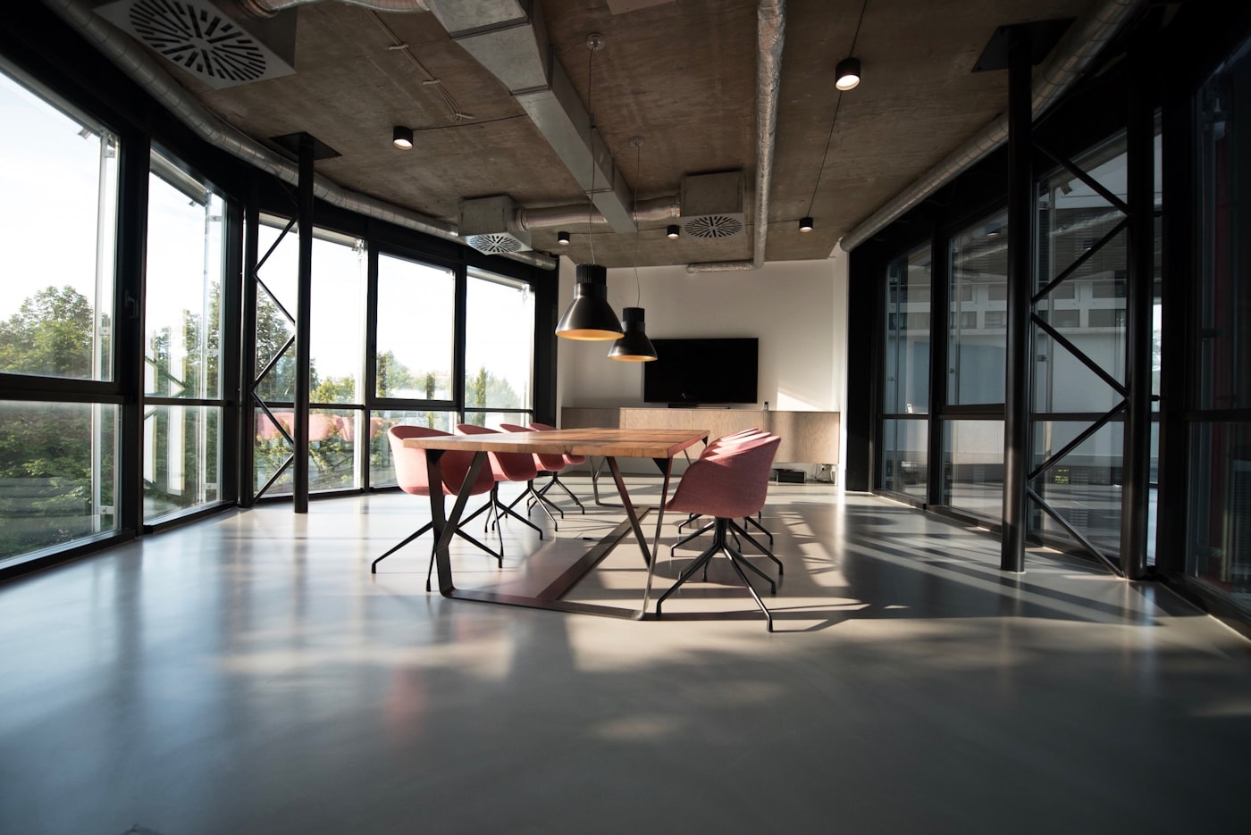 A tidy modern workspace desk with a laptop